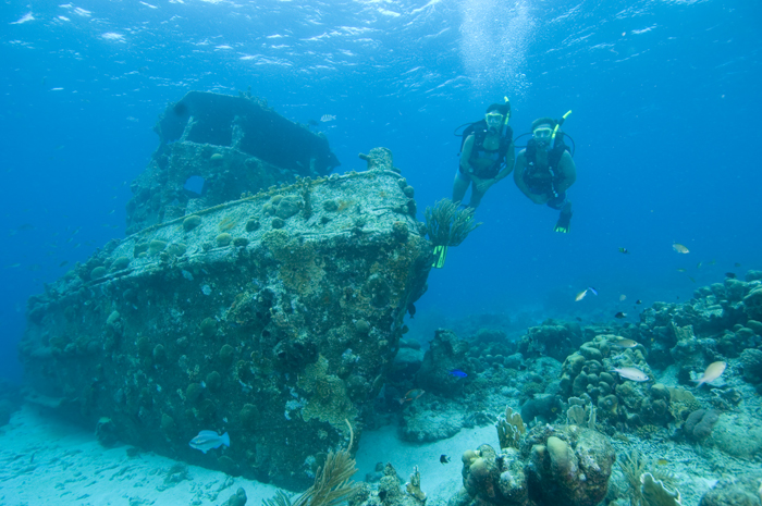 Wreck diving with two scuba divers