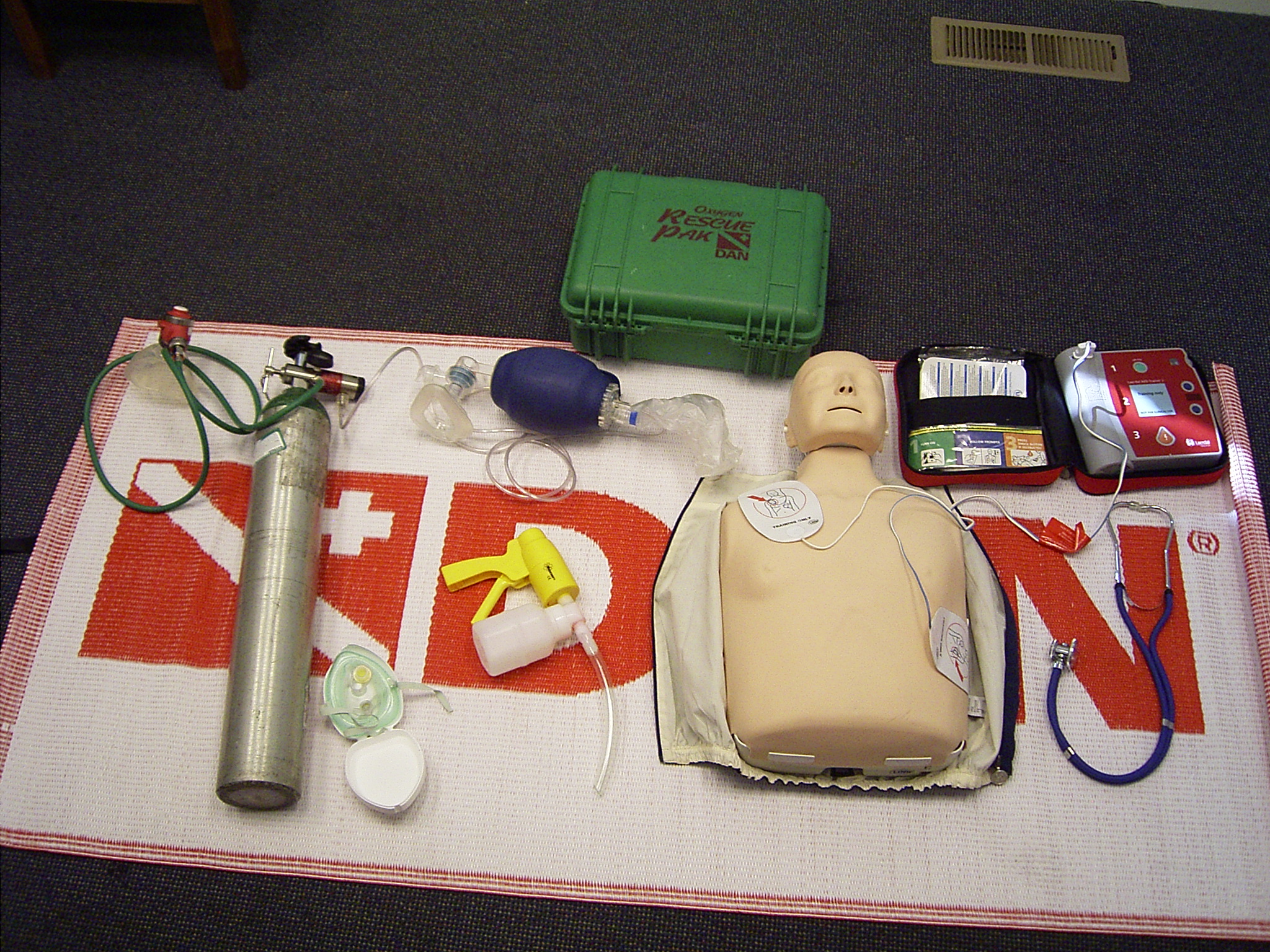 Divers Alert Network Instructor tools: manikin, aed, oxygen, suction, bag valve mask and pocket mask. You'll use all of then in your Instructor Qualification Course